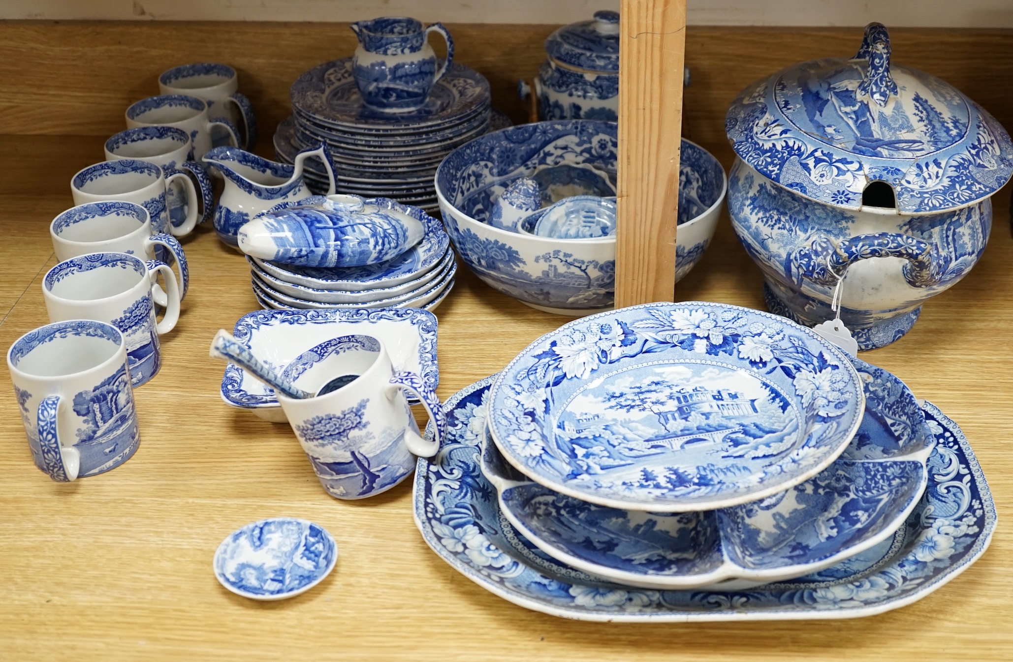 A collection of blue and white Spode Italian dinnerware to include mugs, plates and lidded tureen, largest 37cm wide. Condition - poor to fair